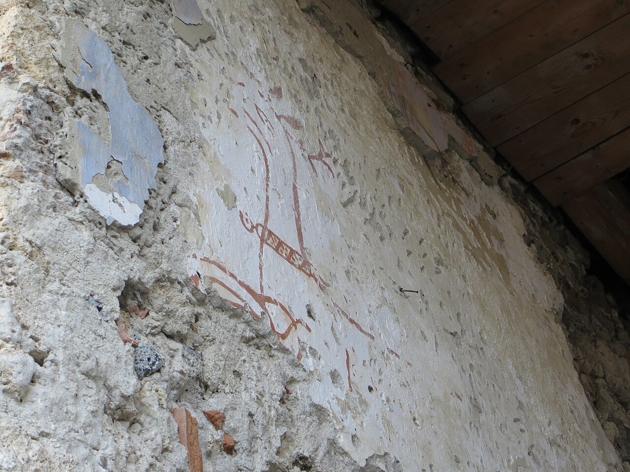 Fragment de pictură al secco și tencuială degradată.